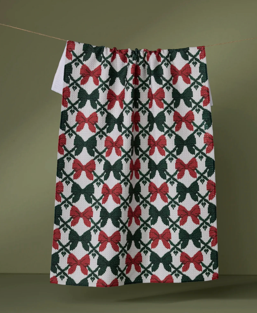 Patterned fabric with red and green bows 