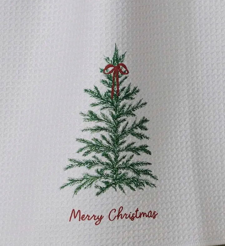 A set of three brass cheese knives with reindeer handles, displayed alongside a printed drawstring bag 