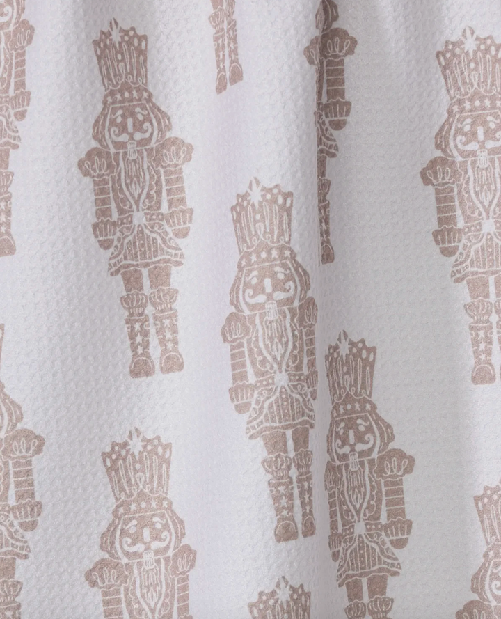 Pattern of decorative nutcrackers on a white background