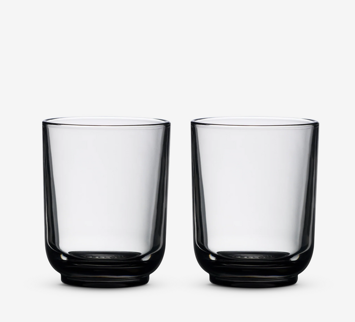 Two clear smokey gray Fellow coffee cups 