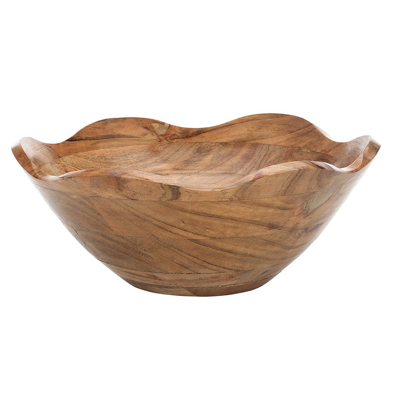 Wooden bowl with wavy edge on a white background