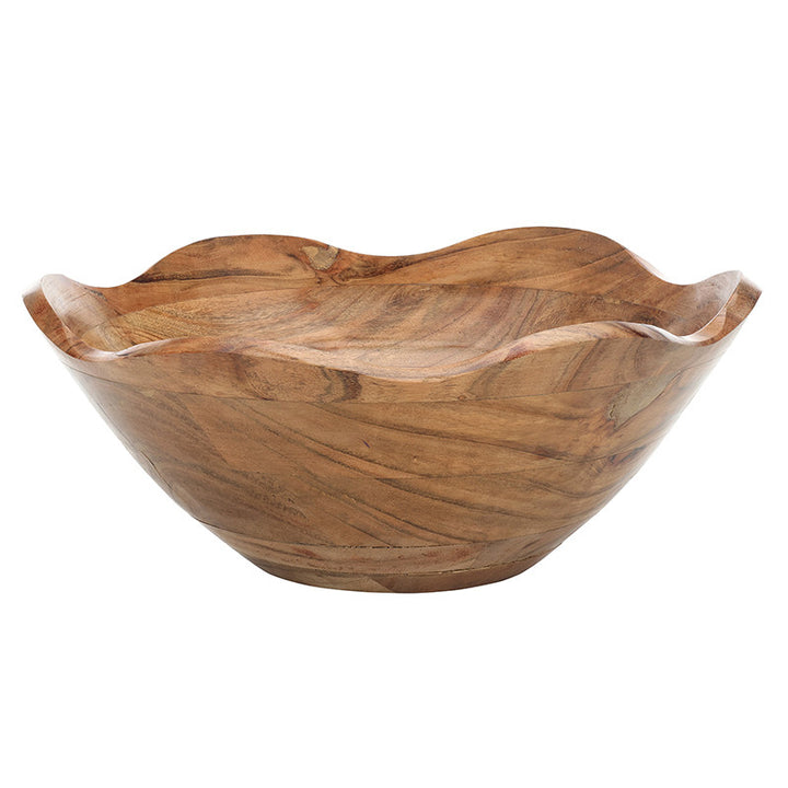 Wooden bowl with wavy edge on a white background