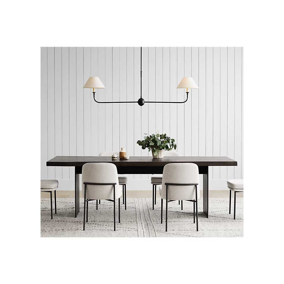 two light black linear chandelier above a kitchen table