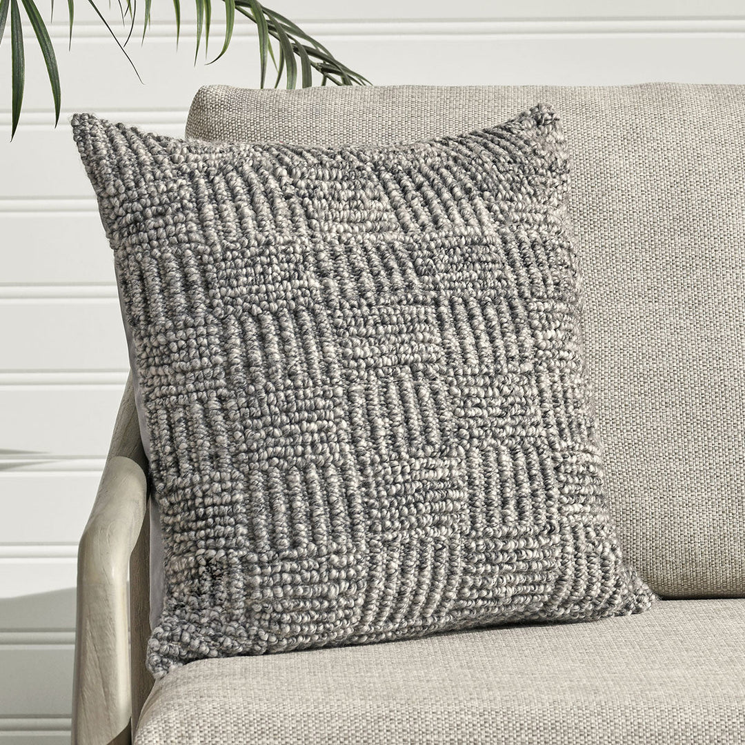 Textured gray decorative throw pillow 