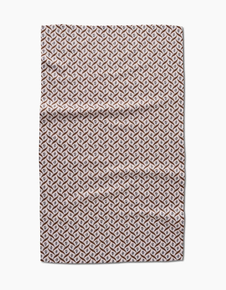 geometry towel with brown leaves and small flowers