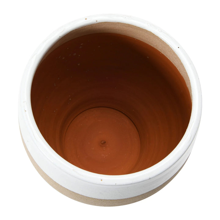 Terracotta pot on a white background