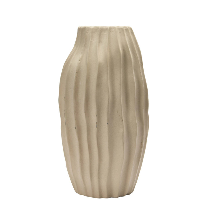 Beige ceramic vase with textured surface on a white background