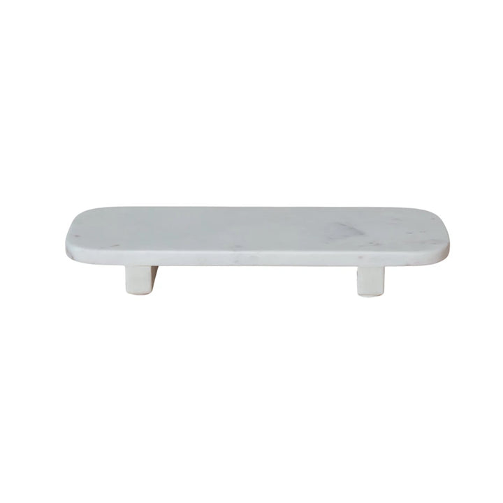 A white marble footed pedestal 