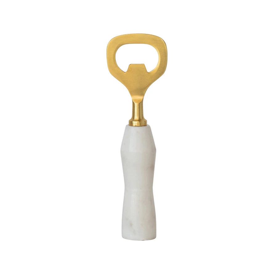 Gold bottle opener with a white marble handle on a white background