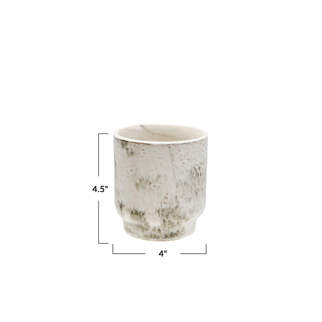 Ceramic planter with dimensions on a white background