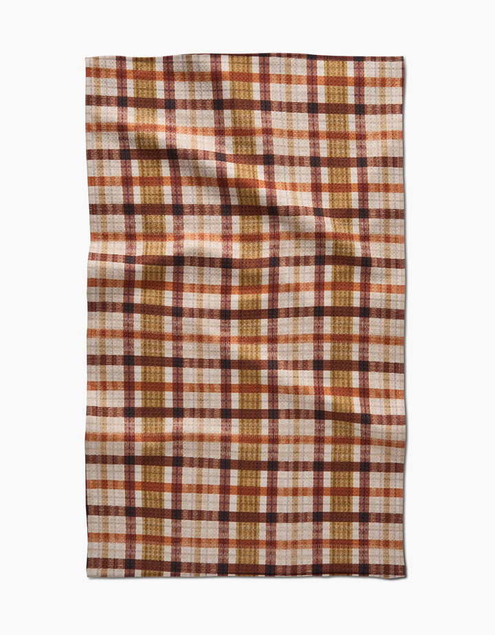 fall plaid tea towel with burnt orange, brown, and burgundy