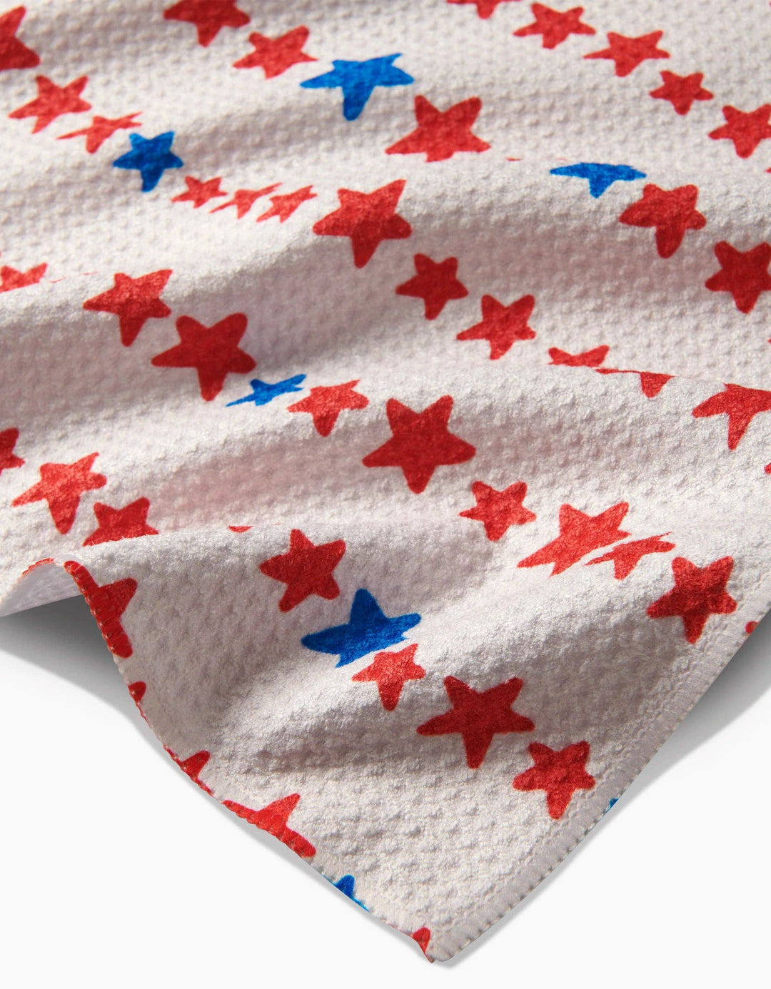 geometry towel with red and blue star pattern on a white background