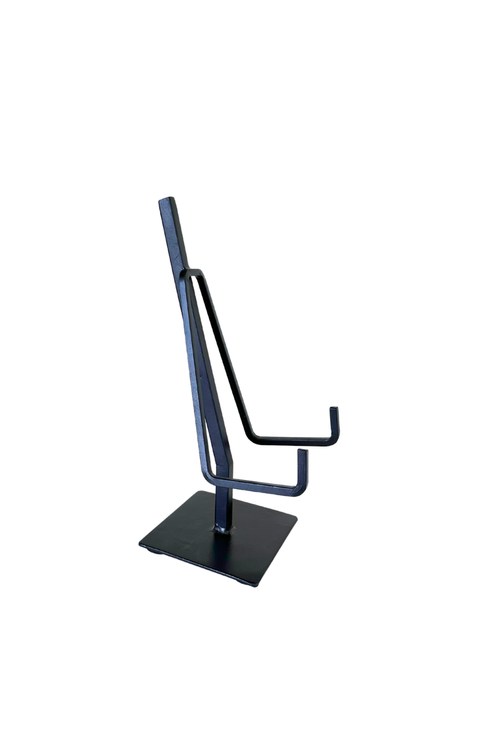 black metal easel with rectangular base