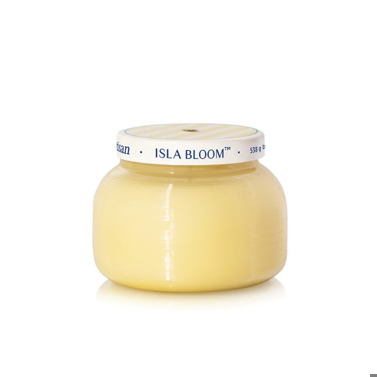 Yellow jar with a white lid labeled 'Isla Bloom' on a white background