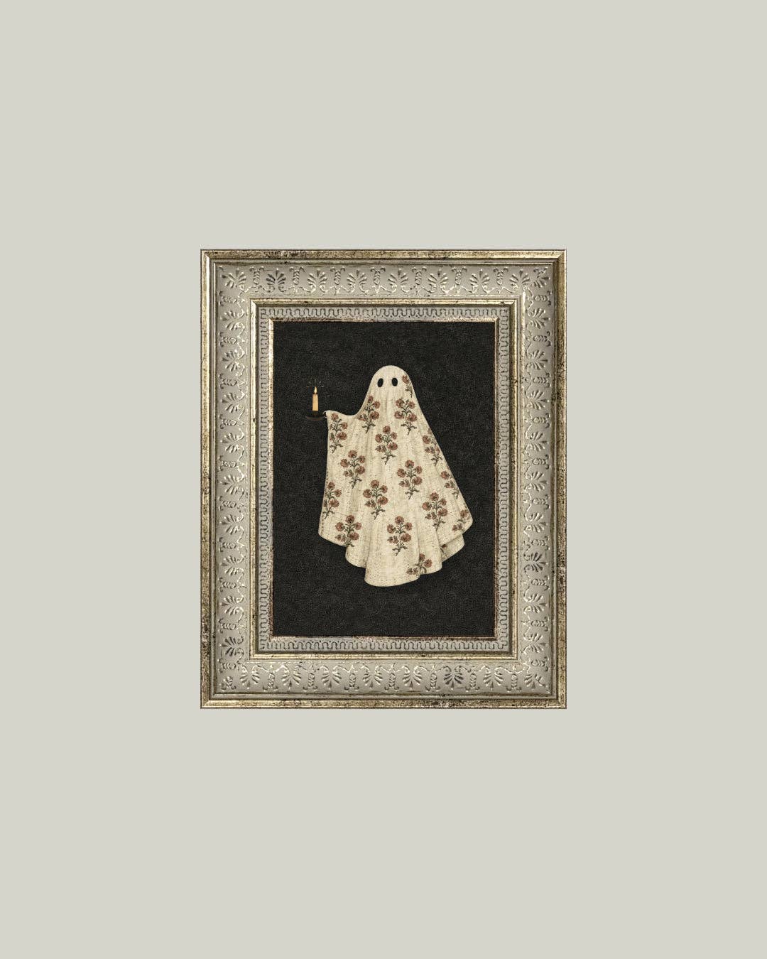 Framed artwork of a ghost with floral patterns on a plain background