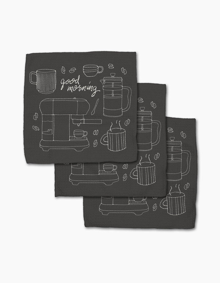 Set of three black dish cloths with white coffee-themed illustrations on a white background