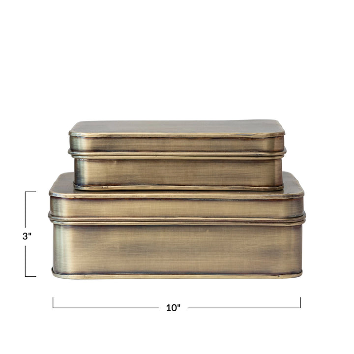 Set of two brass-colored rectangular boxes with dimensions on a white background