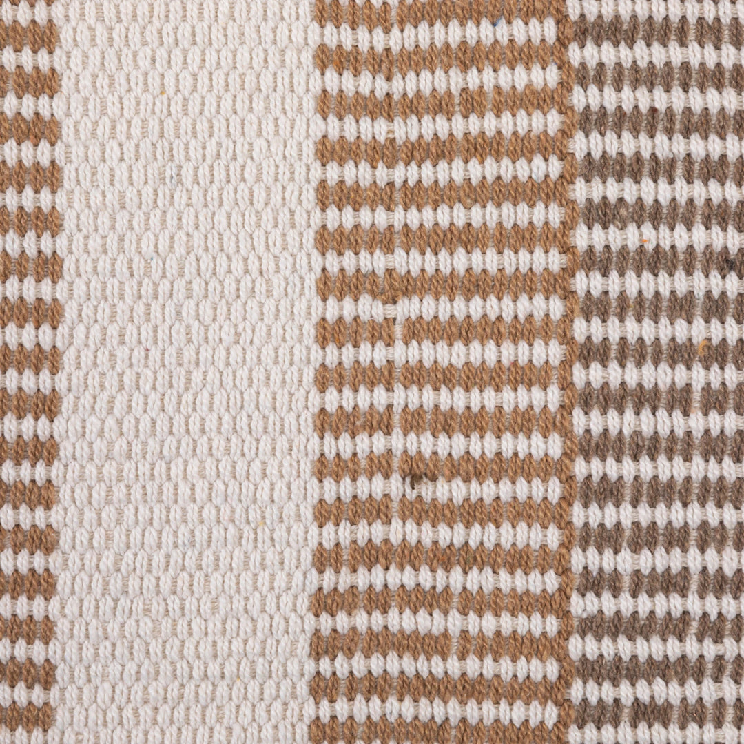 close-up woven white blanket with brown stripes