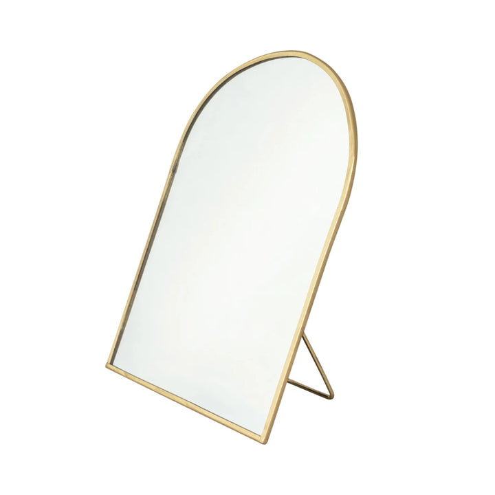 Gold-framed mirror on a white background