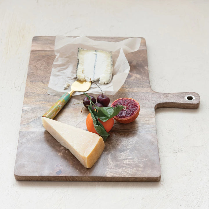 large wooden cutting board with handle