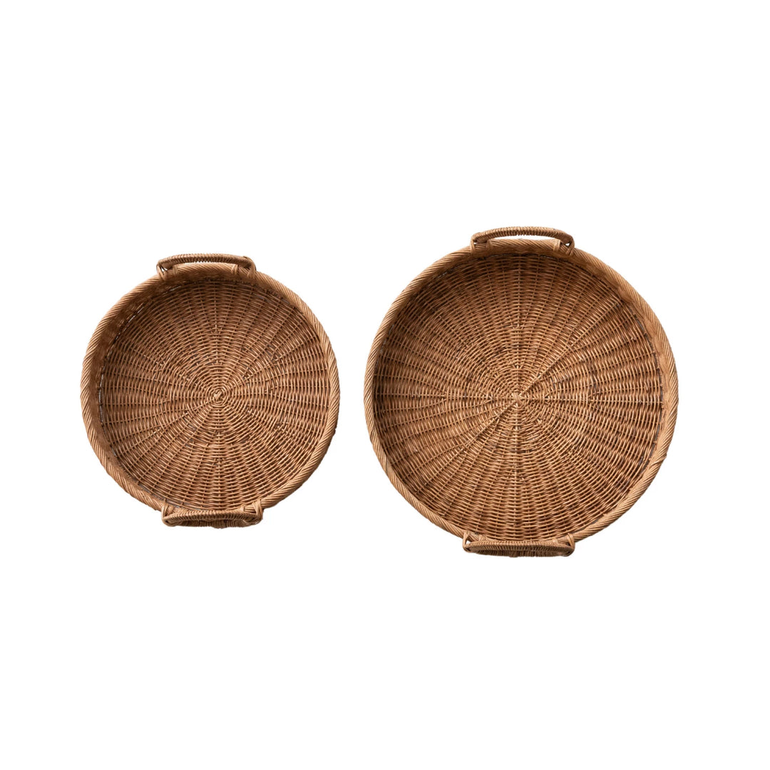 Two woven baskets with handles on a white background