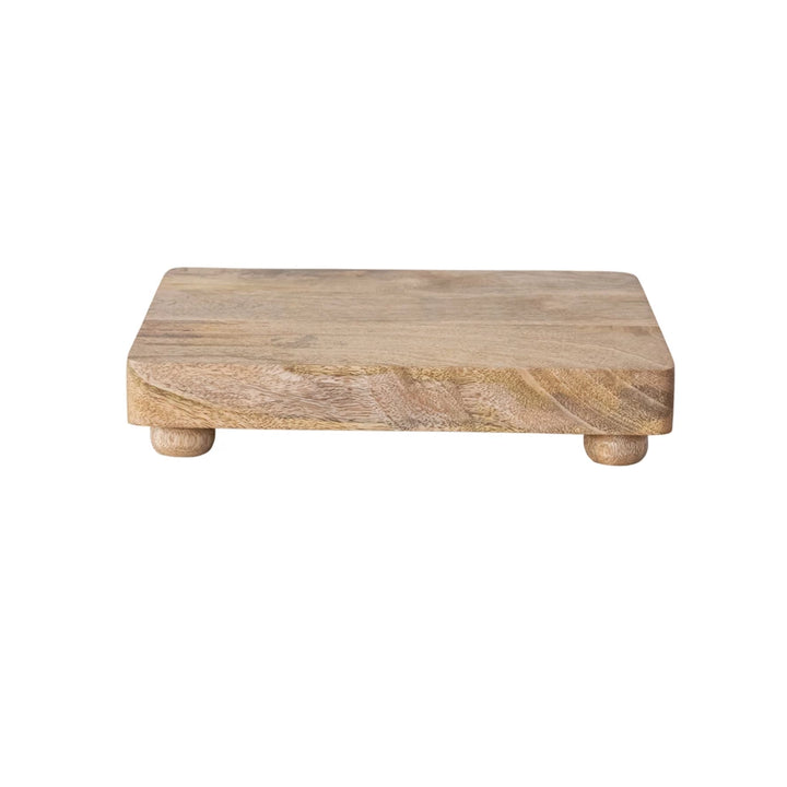 Wooden serving tray with rounded edges on a white background