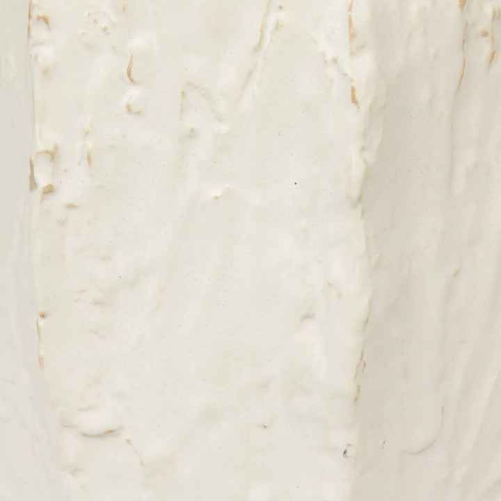Close-up of a beige marble surface with subtle veining