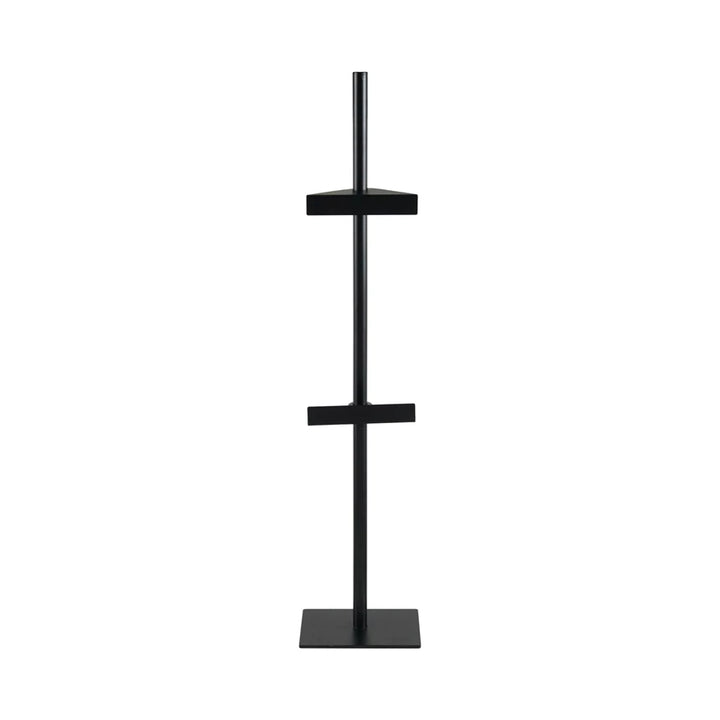 Black metal easel with multiple shelves on a white background
