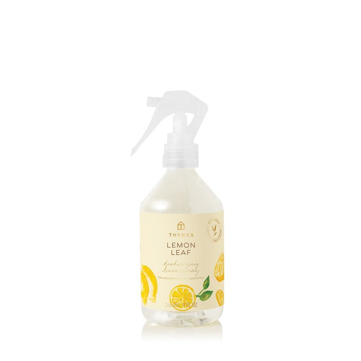 Lemon leaf deodorizing linen spray bottle on a white background