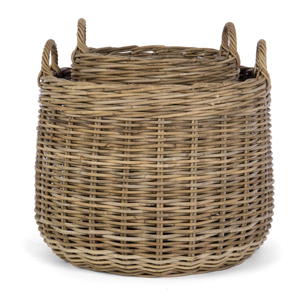 Wicker basket with handles on a white background
