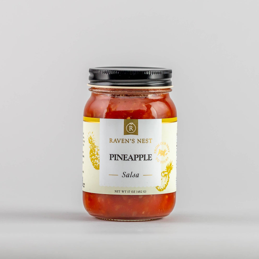 Jar of Pineapple Salsa from Raven's Nest on a gray background