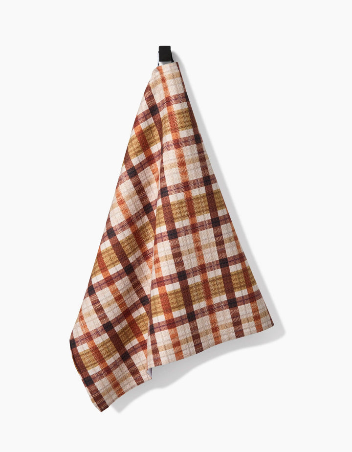 fall plaid tea towel with burnt orange, brown, and burgundy