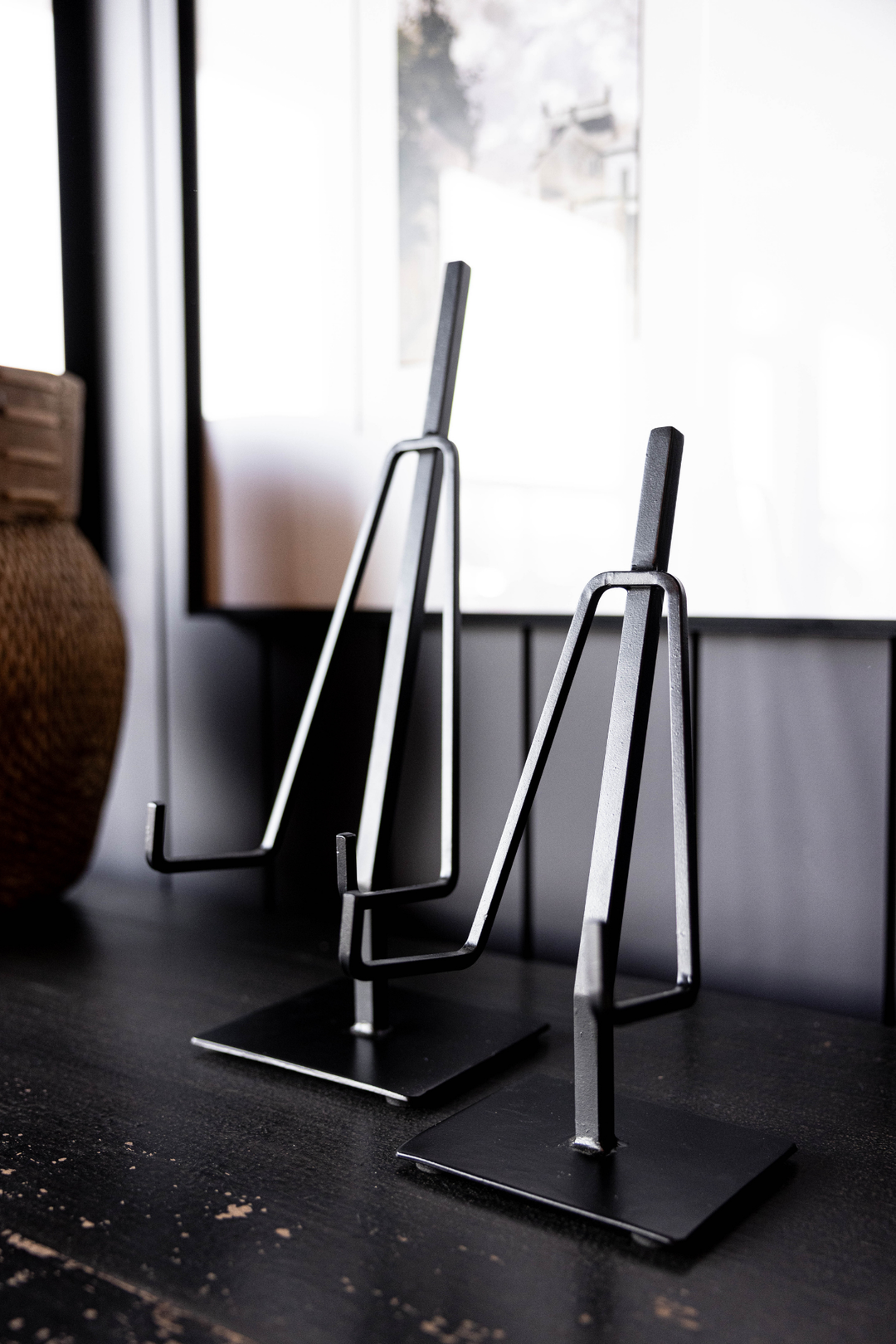 black metal easel with rectangular base in two sizes