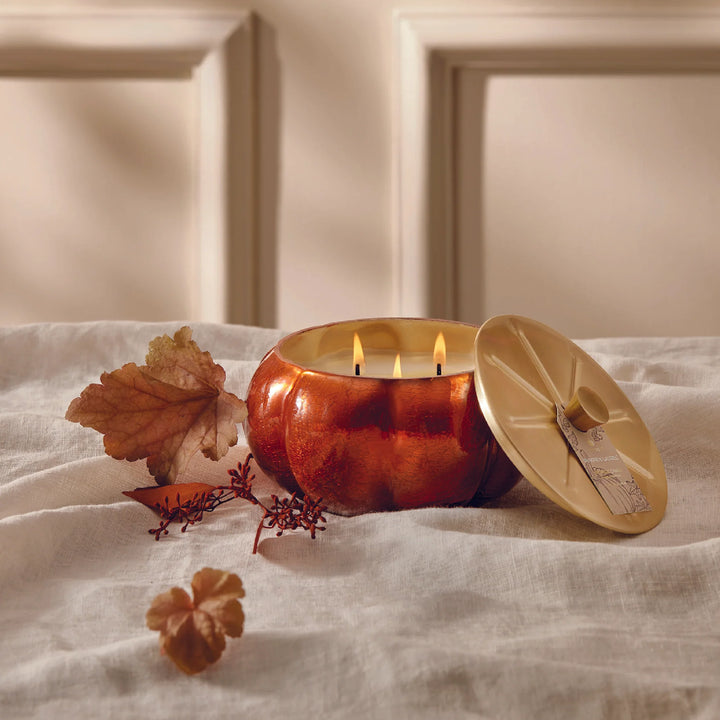 Pumpkin laurel scented pumpkin shaped candle with gold lid